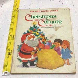 🍀2/10.00🍀 vintage 1973 board book, Christmas is Coming, has usage wear